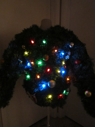 Illustration for article titled 8 Awesome* Teched-Out Christmas Sweaters